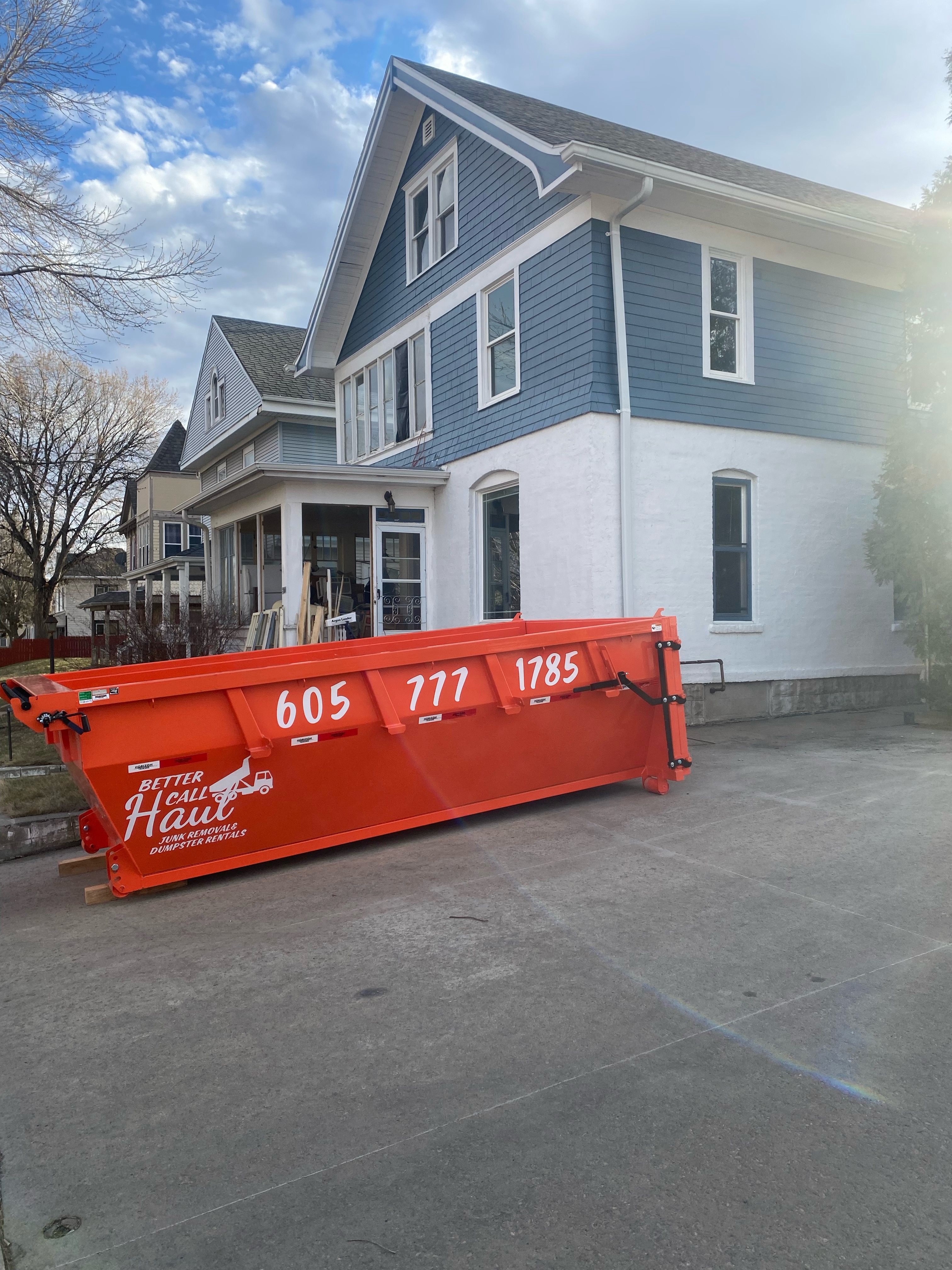 Better Call Haul dumpster at residential home in Sioux Falls